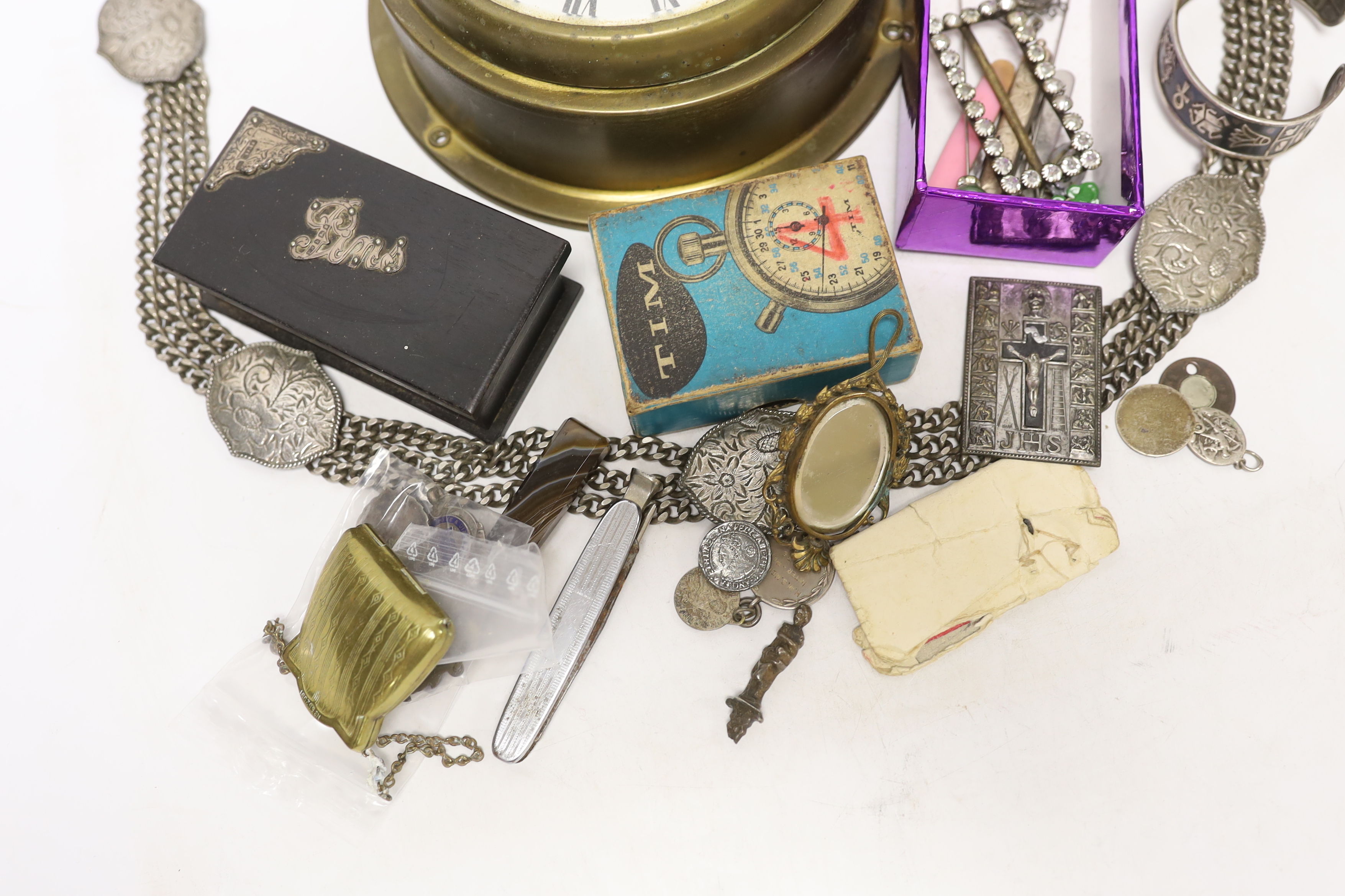 A quantity of mixed collectibles to include an eight day tortoiseshell and metal mounted travel clock, etc.